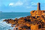 Ploumanach lighthouse sunset view (Perros-Guirec, Brittany, France). The Pink Granite Coast.