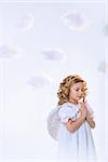 Little girl with wings in studio