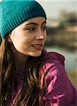 Close-up portrati of teenage girl outdoors wearing toque, looking to the side, Germany