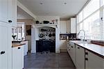 Modern country style kitchen in Macclesfield townhouse, Cheshire, England, UK