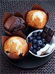 Blueberry chocolate coconut muffins with fruit and chocolate pieces