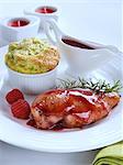 Chicken breast in raspberry sauce with soufflé