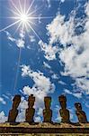 Moai with scoria red topknots at the restored ceremonial site of Ahu Nau Nau on Easter Island (Isla de Pascua) (Rapa Nui), UNESCO World Heritage Site, Chile, South America