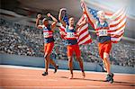 American athletes celebrating on track