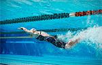Swimmer racing underwater