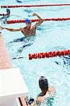 Swimmer celebrating in pool