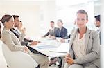 Portrait of confident businesswoman in conference room