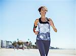 Woman running on beach