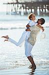 Couple hugging on beach