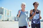 Senior women jogging outdoors