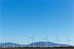 Wind farm under blue sky