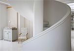 Spiral staircase in luxury foyer