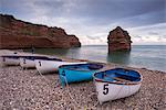 Boats pulled up on the shingle at Ladram Bay on the Jurassic Coast, UNESCO World Heritage Site, Devon, England, United Kingdom, Europe