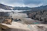 Blue glacial water in a glacier on Mutnovsky volcano, Kamchatka, Russia, Eurasia