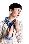 Portrait of Young Woman wearing Modern Jewellery, Studio Shot