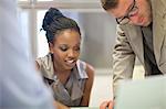 Young businesswoman presenting ideas in meeting