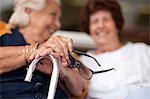 Two happy senior women chatting