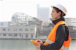 Female dockworker using monitor