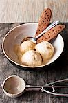 coffee ice cream in a bowl with biscuits