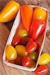 Yellow and red tomato and pepper varieties