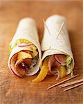 Wraps filled with smoked turkey breast and oranges