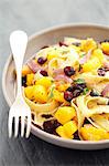 Tagliatelle with squash, cranberries and parsley