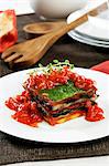 Layered grilled vegetables with tomato sauce