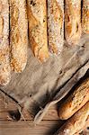 Several baguettes lying on jute