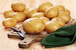 White Elfe potatoes on a chopping board