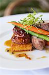 Duck Breast, Vegetables and Roasted Apples over Crisped Polenta