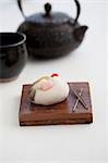 Wagashi crane (for New Year) with a teapot (Japan)