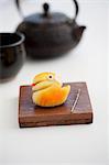 Wagashi snake (Year of the Snake) with a teapot (Japan)
