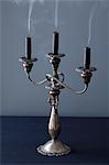 A Candelabra with Three Dark Candles Just blown Out