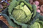 Savoy cabbage in a basket at the market