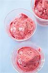 Home-made raspberry ice cream in three glasses