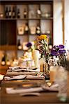 A table laid for a celebration with colourful flowers