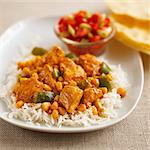 Chicken curry with sweetcorn and peppers on a bed of rice