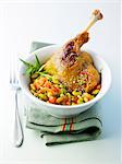 Duck leg with tarragon,flageolet beans cooked with fresh tomatoes