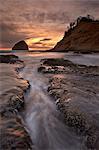 Haystack Rock at sunset, Pacific City, Oregon, United States of America, North America