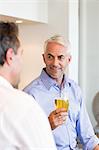 Two business colleagues drinking beer