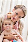 Mother with baby boy at home