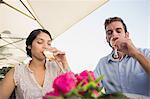 Happy couple celebrating their anniversary with champagne