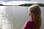 Girl looking at water, Skane, Sweden