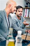 Two men working in office, Gothenburg, Sweden