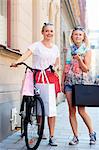 Young women with shopping bags, Stockholm, Sweden