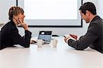 Businesswoman and businessman during meeting, Stockholm, Sweden