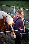 Teenage girl with horse, Gotland, Sweden