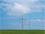 High-voltage transmission towers and field, Weser Hills, North Rhine-Westphalia, Germany