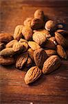 Almonds on a wooden surface