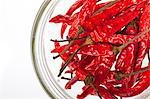 Dried red chillies in a glass bowl